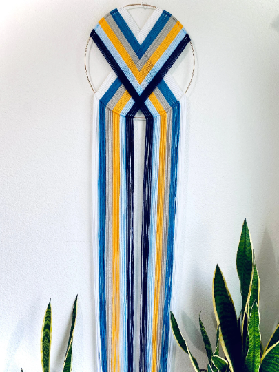 “Elevate” macramé heart weave wall hanging 💙💛🤍